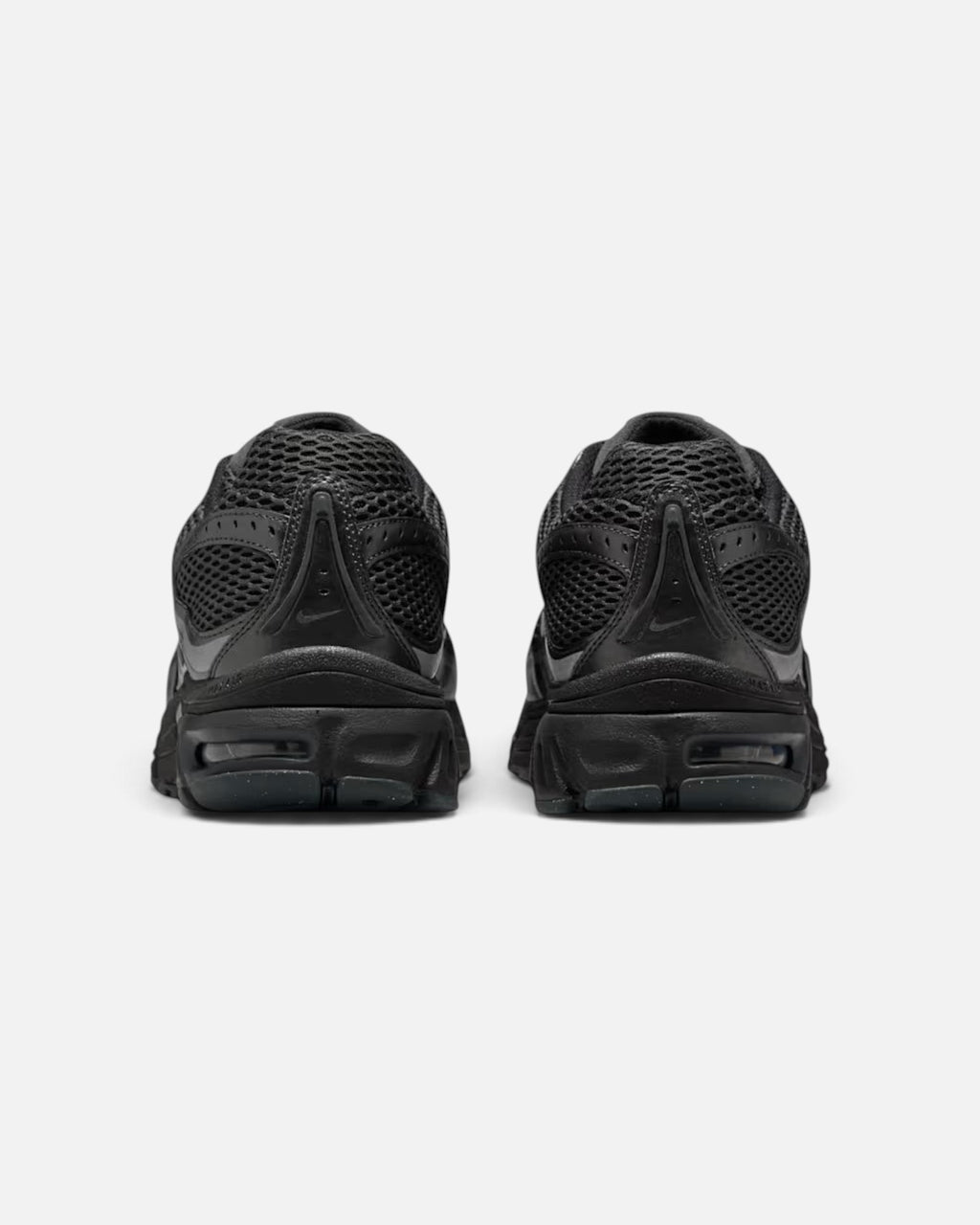 CRIUW NIKE AIR MAX MOTO 2K sneakers in black, showing the rear view with mesh detailing and cushioned soles.