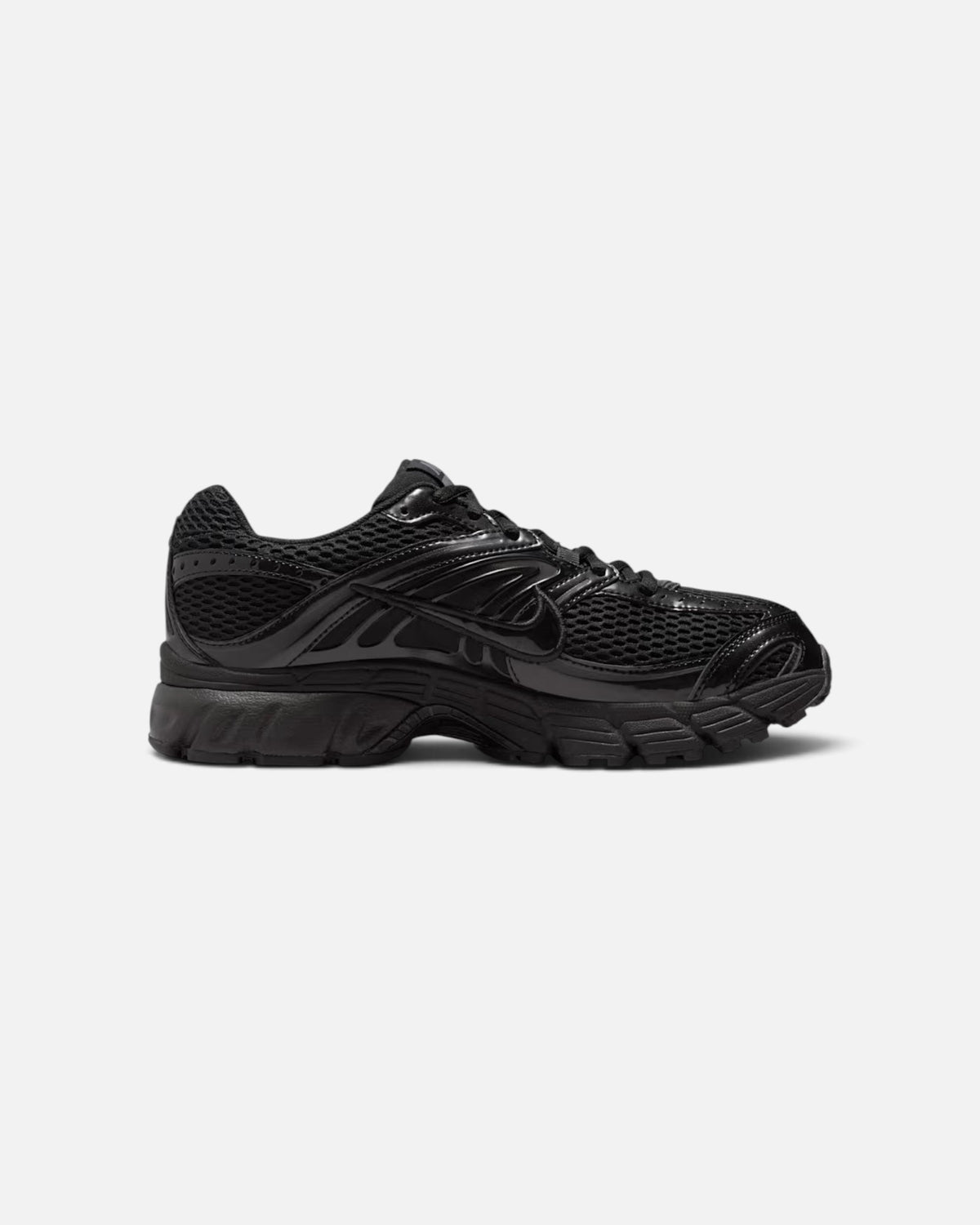CRIUW Nike Air Max Moto 2K sneakers in all-black with mesh and metallic detailing, side profile view.