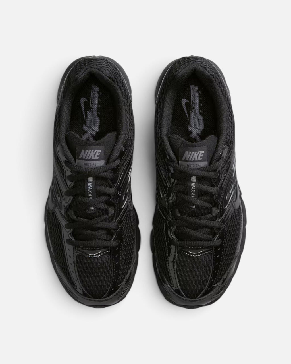 CRIUW Nike Air Max Moto 2K sneakers in all black with metallic accents and mesh upper, top-down view