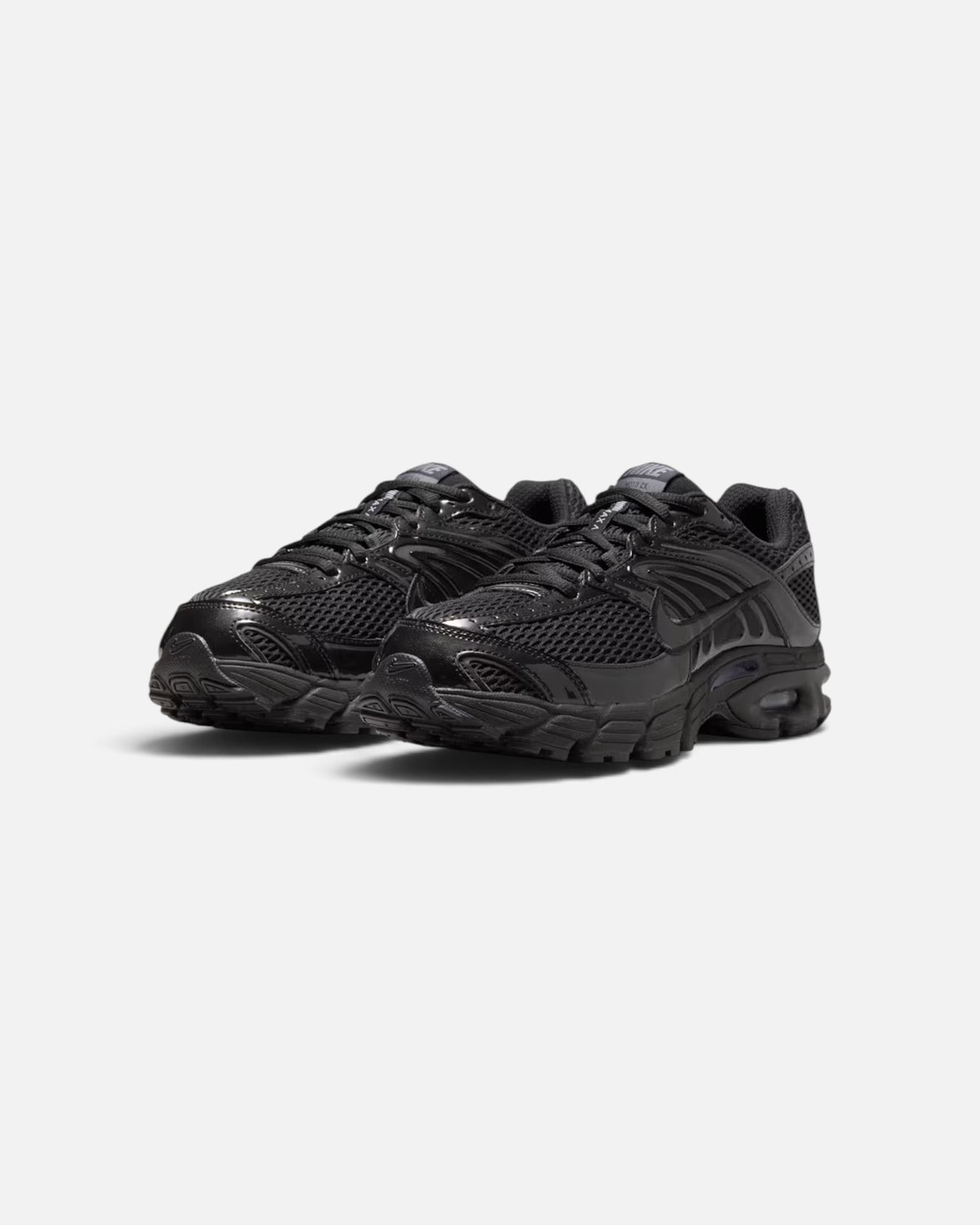 CRIUW Nike Air Max Moto 2K sneakers in all-black with metallic details and mesh upper for performance and comfort.