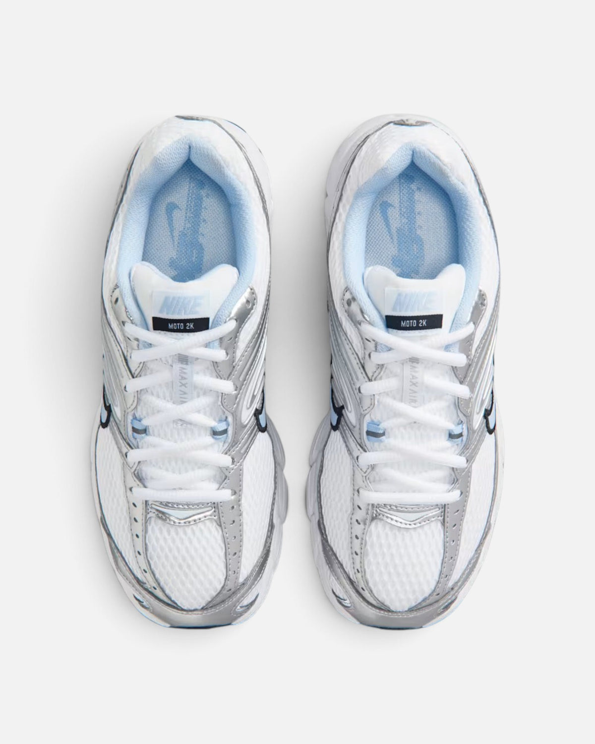 CRIUW Nike Air Max Moto 2K sneakers in hydrogen blue and white with metallic silver overlays and mesh detailing.