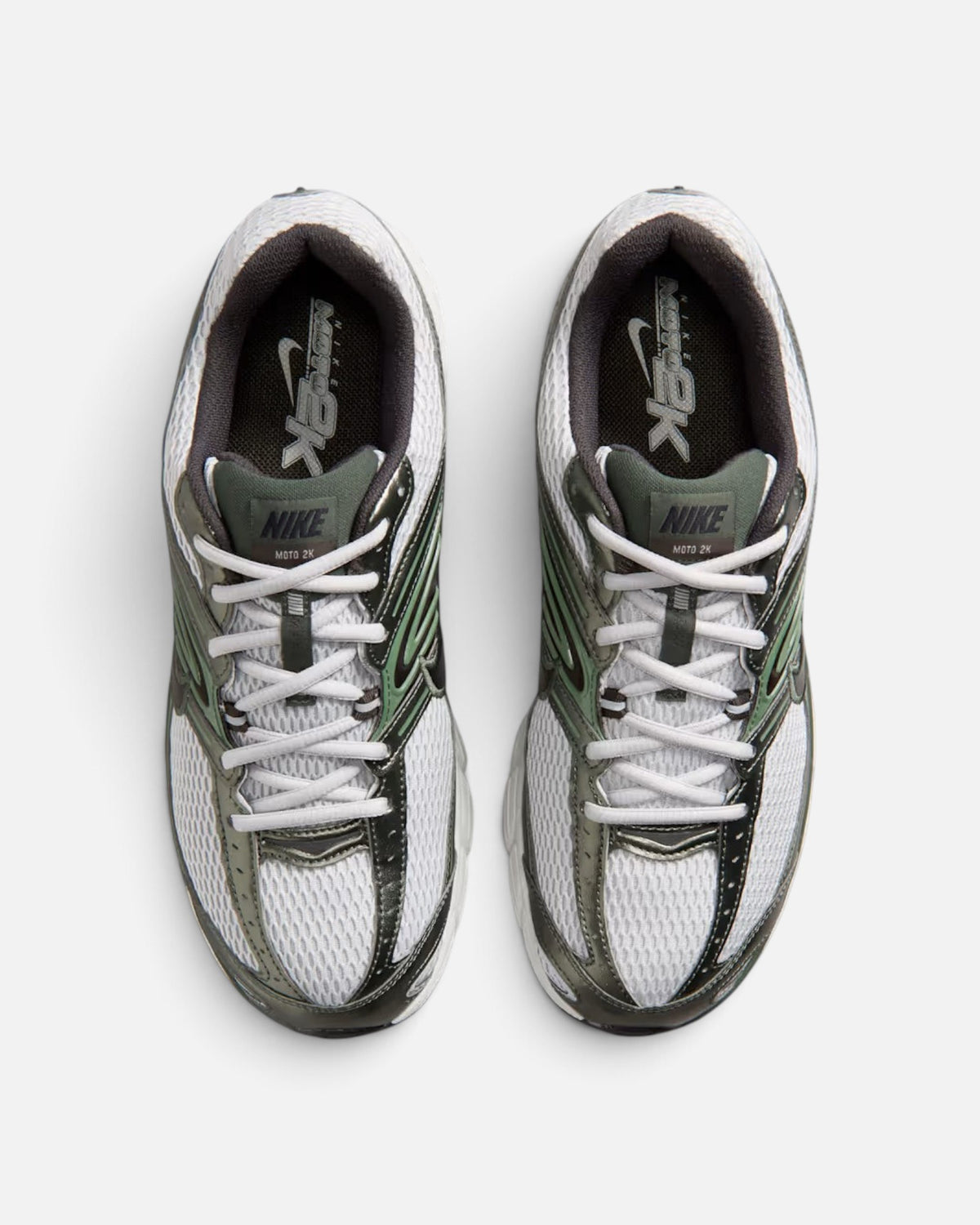 CRIUW Nike Air Max Moto 2K sneakers in grey fog with metallic accents and white mesh, top-down view.