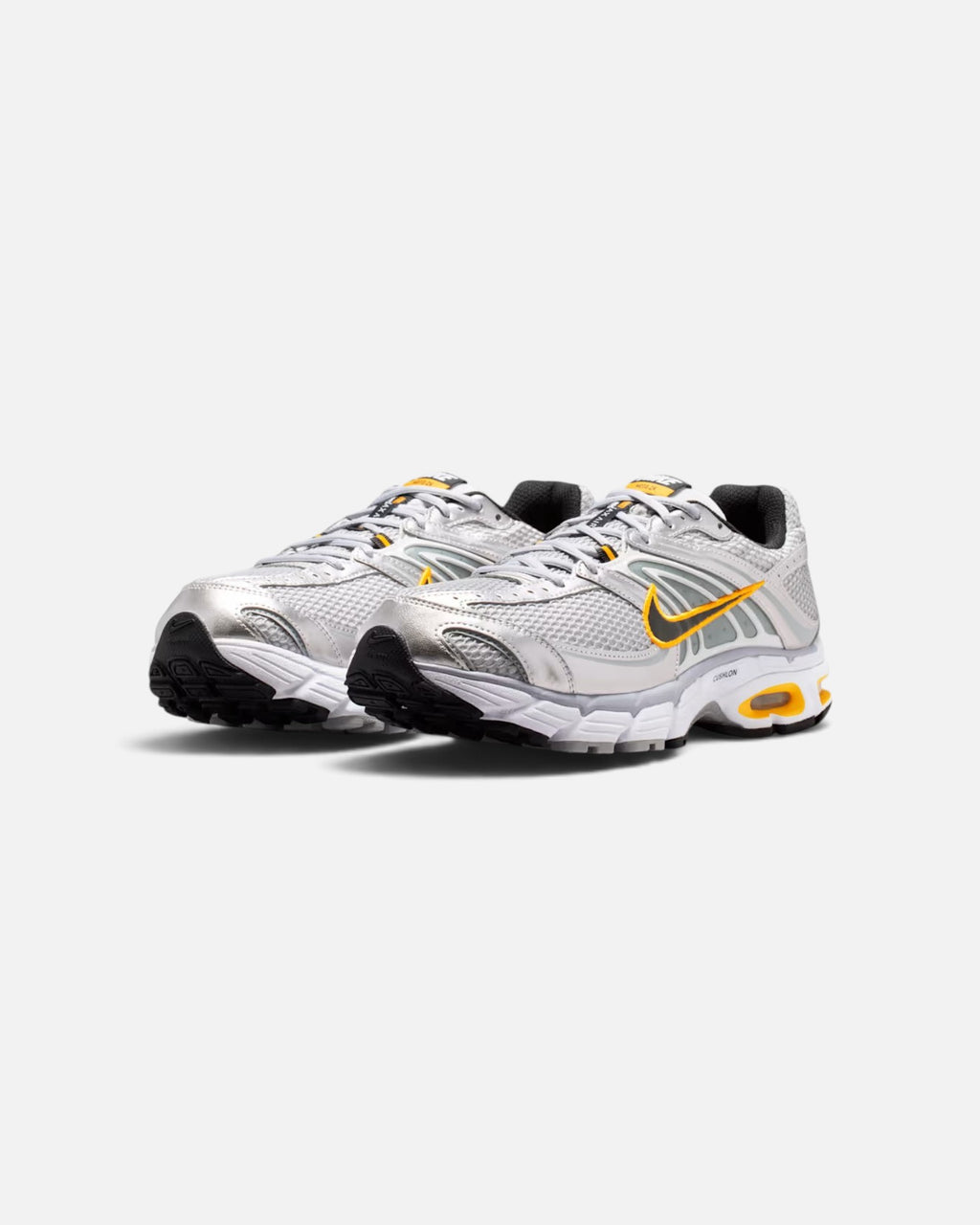 CRIUW Nike Air Max Moto 2K sneakers in wolf grey with yellow swoosh and metallic mesh details on a white background.