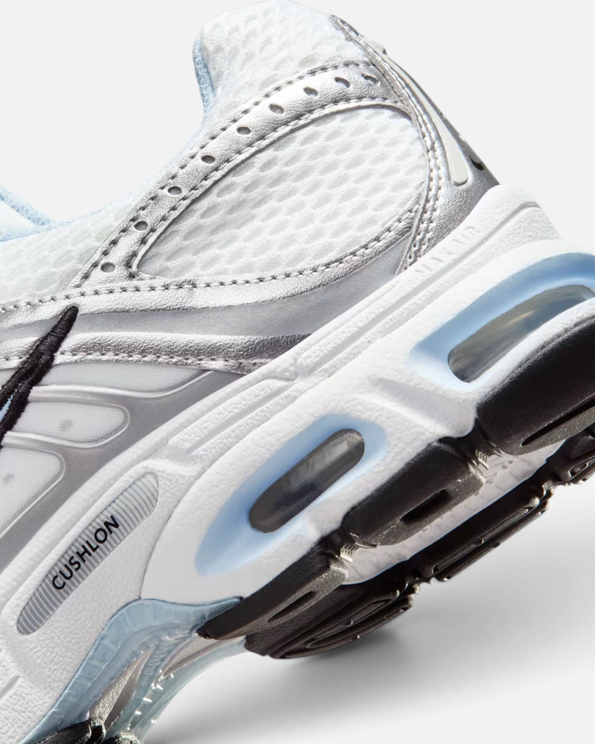 CRIUW Nike Air Max Moto 2K sneaker in hydrogen blue and white with metallic silver accents and Cushlon foam sole