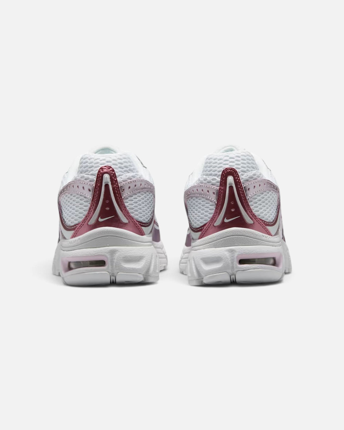 CRIUW Nike Air Max Moto 2K sneakers in bleached lilac and white with metallic accents, rear view showing heel detail.