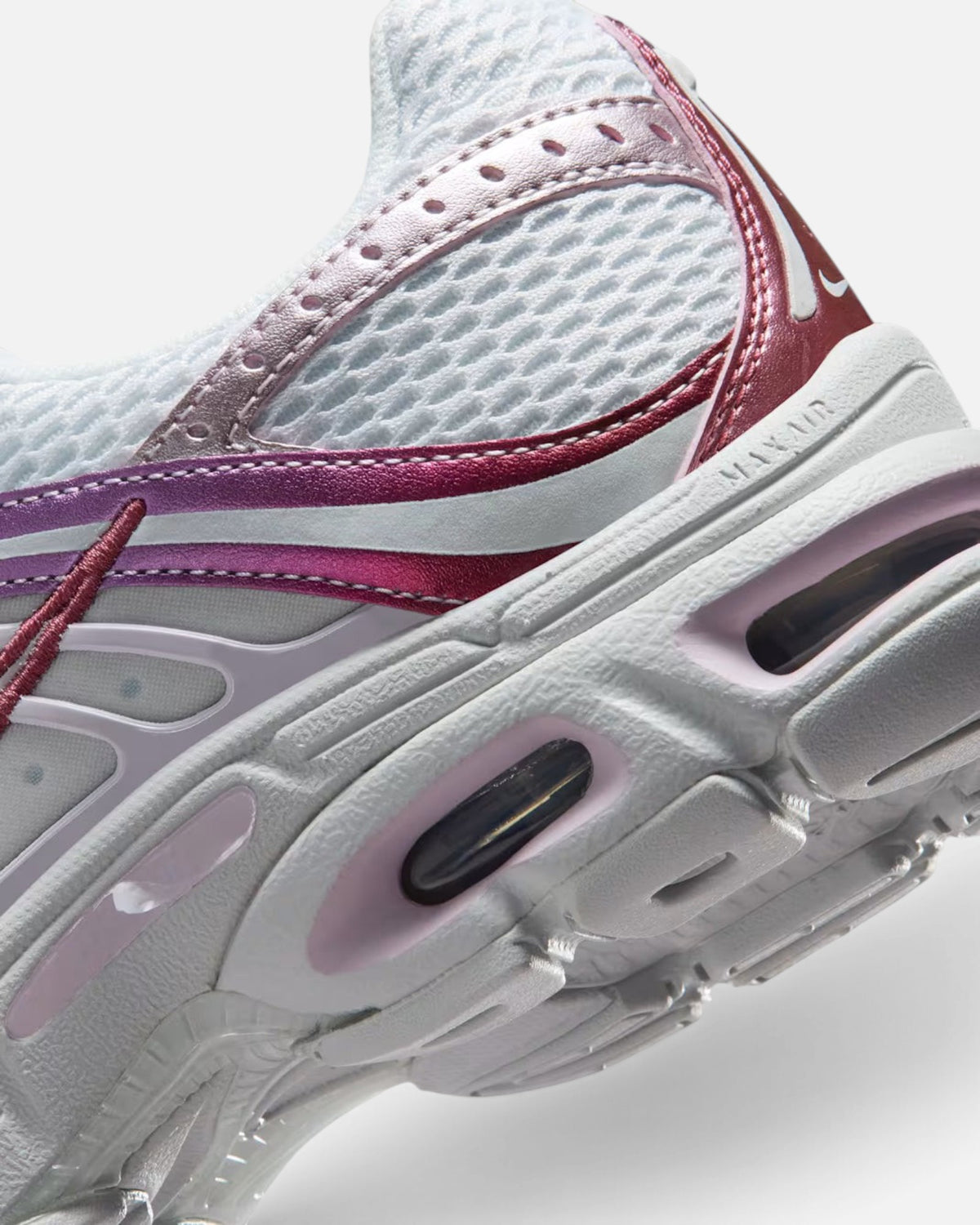 CRIUW Nike Air Max Moto 2K sneakers in bleached lilac with metallic pink accents and white mesh detailing.