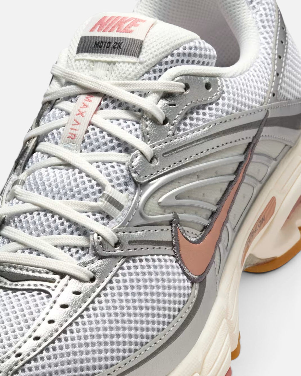 CRIUW Nike Air Max Moto 2K sneakers in white mesh with metallic red bronze accents and performance cushioning