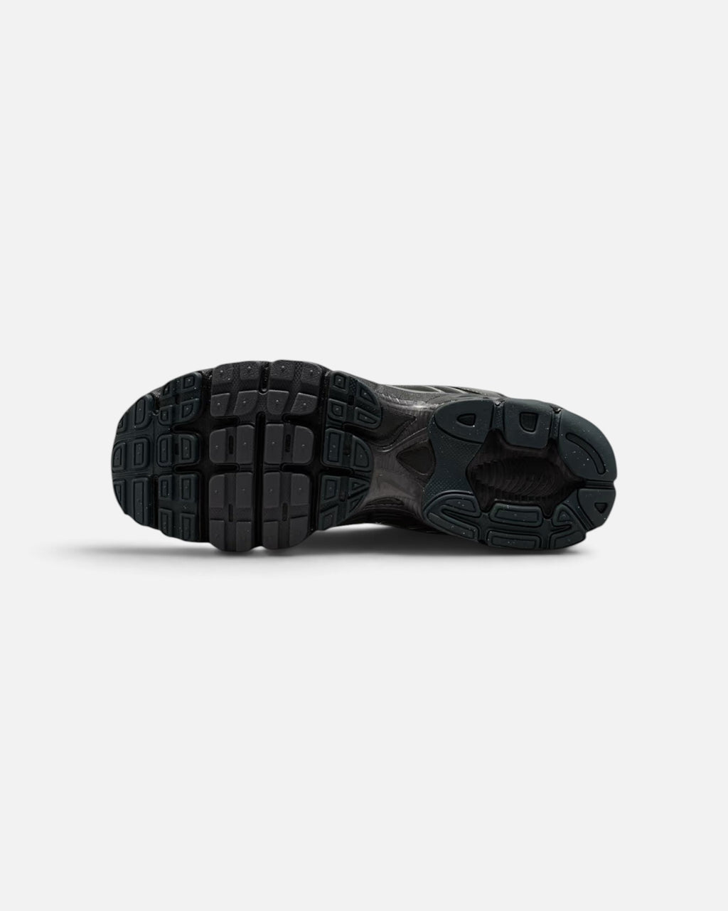 CRIUW Nike Air Max Moto 2K sneaker showing the black rubber outsole with performance grip and cushioning details