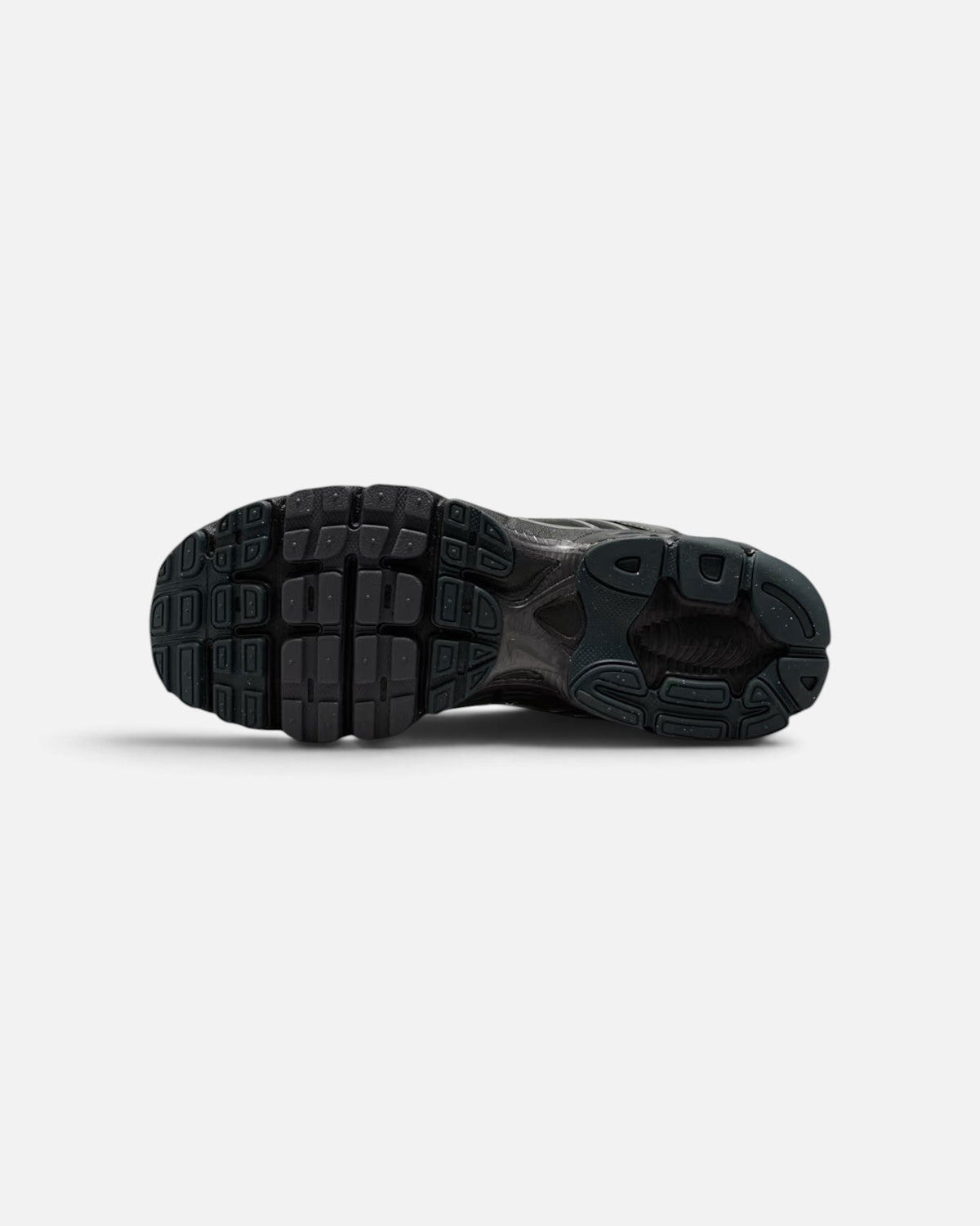 CRIUW Nike Air Max Moto 2K sneaker showing the black rubber outsole with performance grip and cushioning details