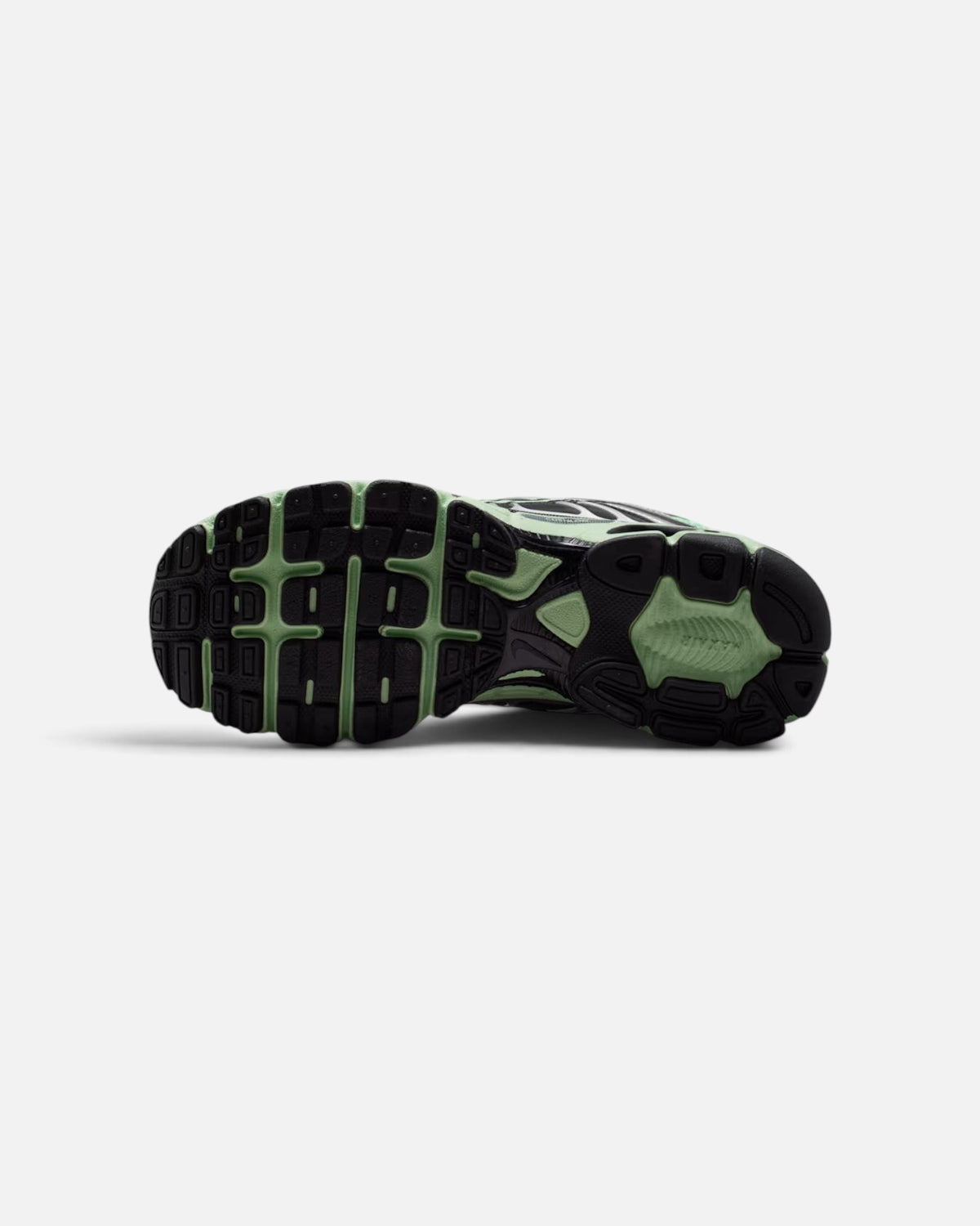 CRIUW Nike Air Max Moto 2K Illusion Green sneaker showing the black and green rubber outsole tread pattern