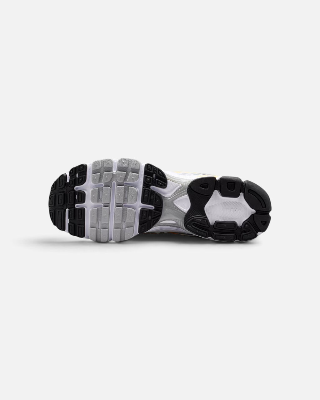 CRIUW Nike Air Max Moto 2K sneaker showing the grey, white, and black textured rubber outsole tread pattern.