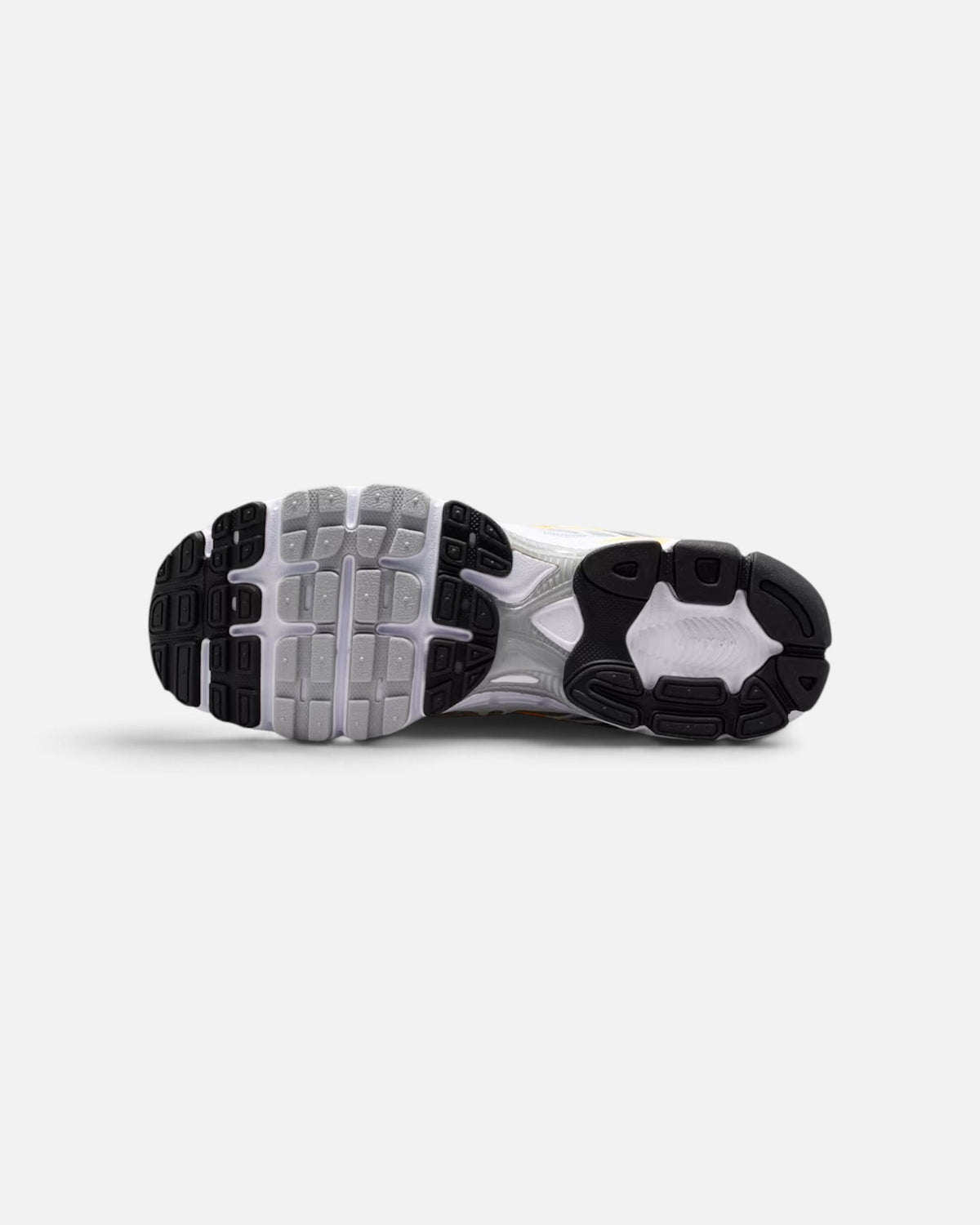 CRIUW Nike Air Max Moto 2K sneaker showing the grey, white, and black textured rubber outsole tread pattern.