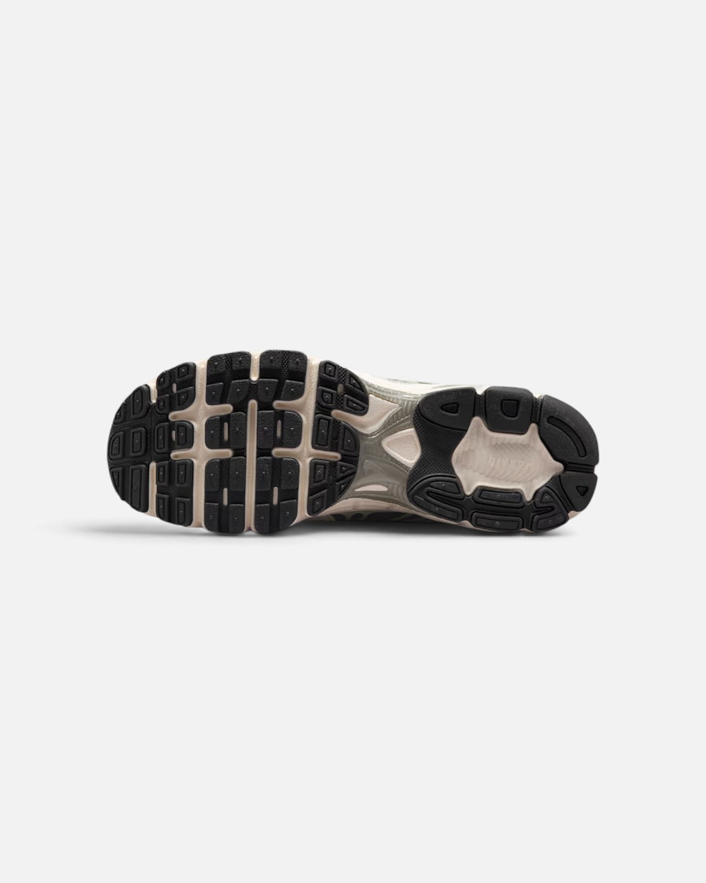 CRIUW Nike Air Max Moto 2K sneaker outsole in camo green and black with durable rubber traction pattern