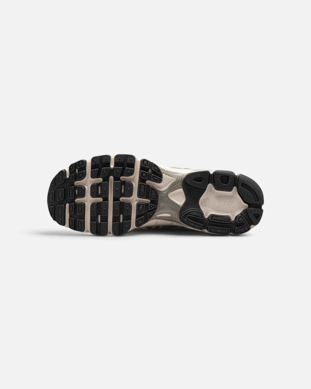 CRIUW Nike Air Max Moto 2K sneaker outsole in camo green and black with durable rubber traction pattern