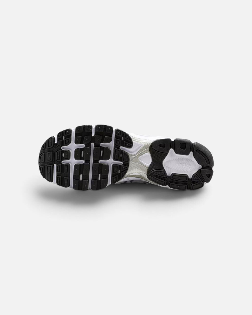 CRIUW Nike Air Max Moto 2K sneaker showing the black and white rubber traction outsole with performance tread pattern