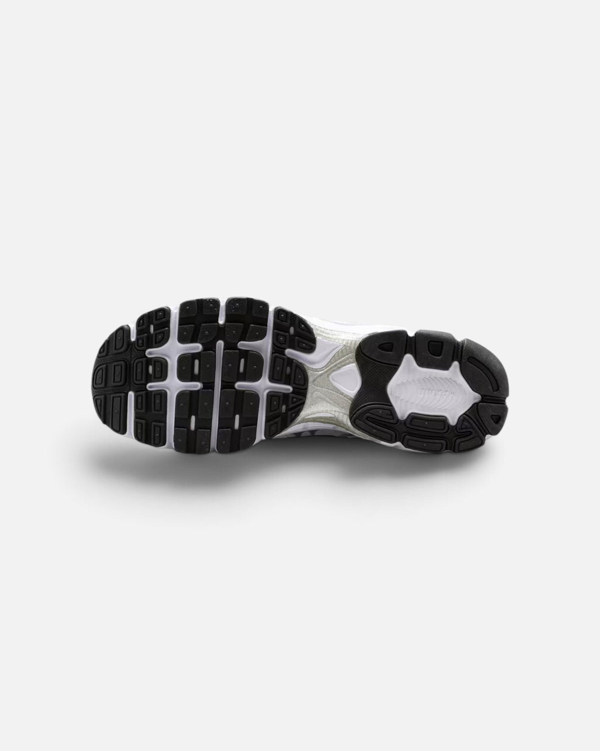 CRIUW Nike Air Max Moto 2K sneaker showing the black and white rubber traction outsole with performance tread pattern