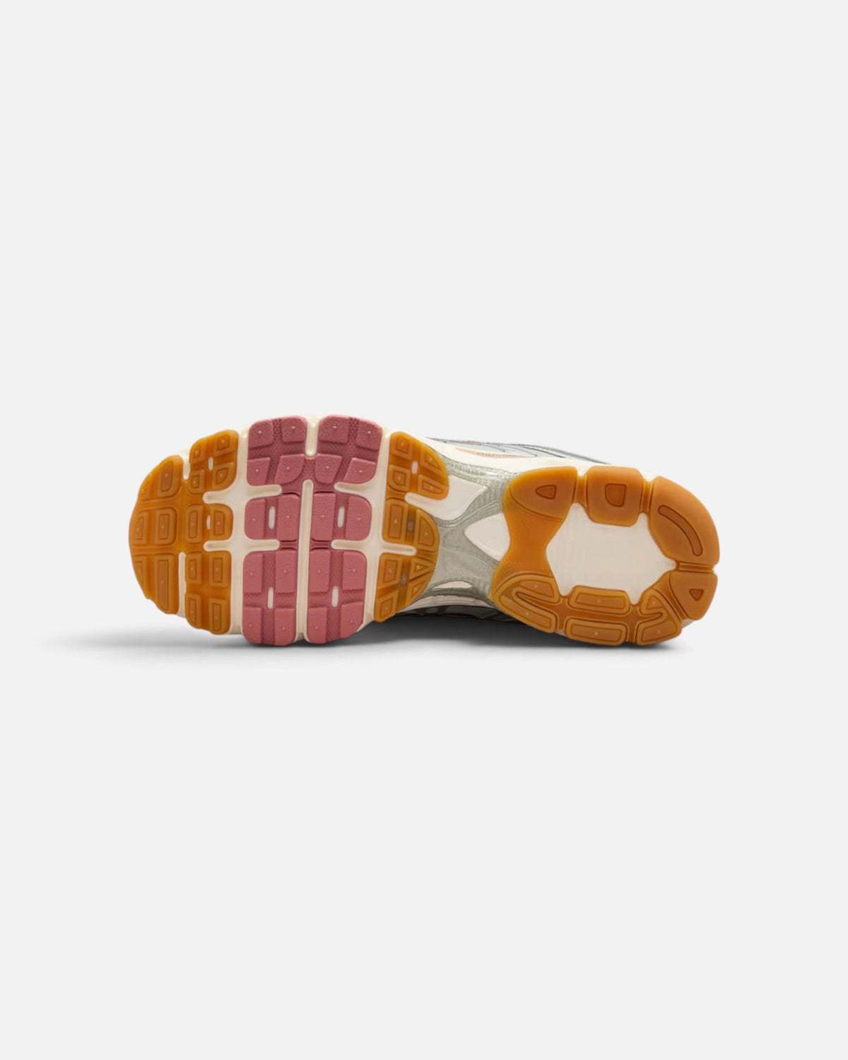 CRIUW Nike Air Max Moto 2K sneaker outsole featuring a multi-colored rubber tread pattern in bronze and pink tones.