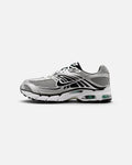 CRIUW Nike Air Max Moto 2K sneaker in off-white and metallic silver with black accents and visible Max Air cushioning