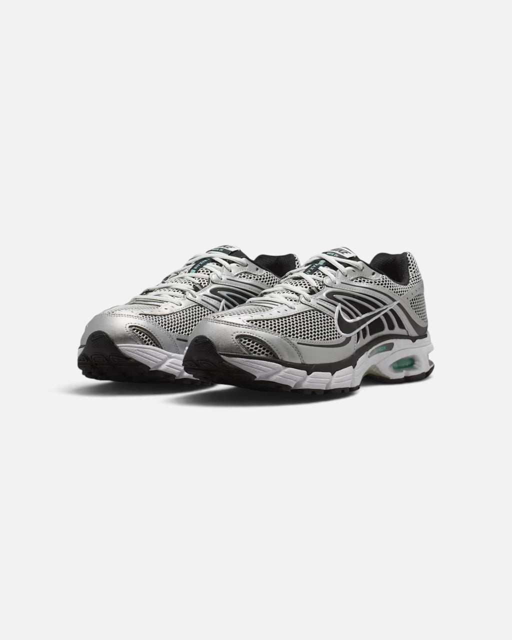 CRIUW Nike Air Max Moto 2K sneakers in off-white and metallic silver with mesh panels and performance cushioning.