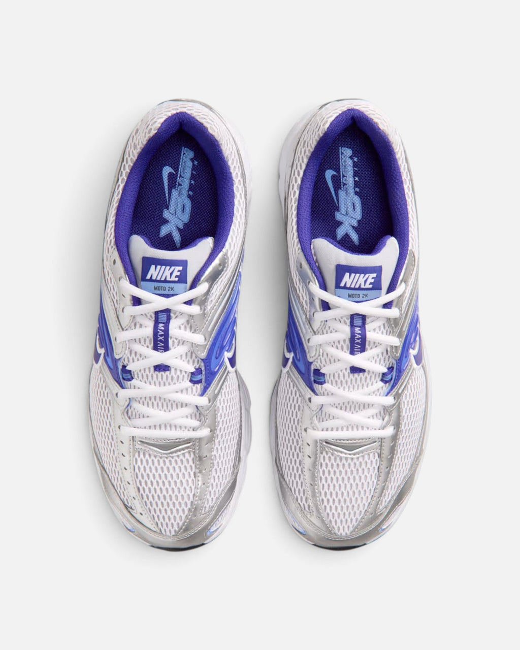 CRIUW NIKE Air Max Moto 2K sneakers in white, silver, and royal pulse with mesh upper and performance cushioning.