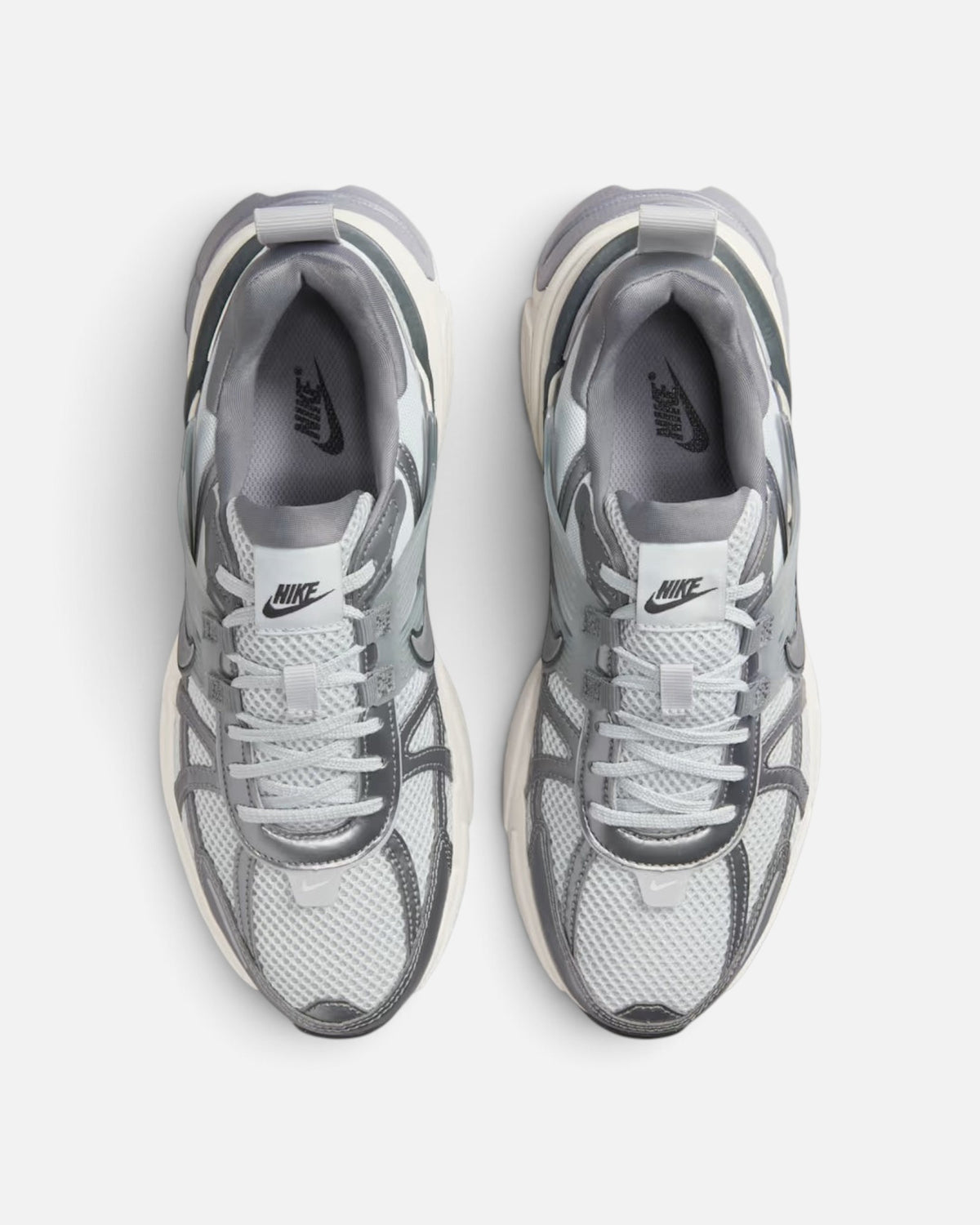 CRIUW NIKE V2K Run sneakers in metallic cool grey with mesh upper and vintage-inspired chunky sole, top view.