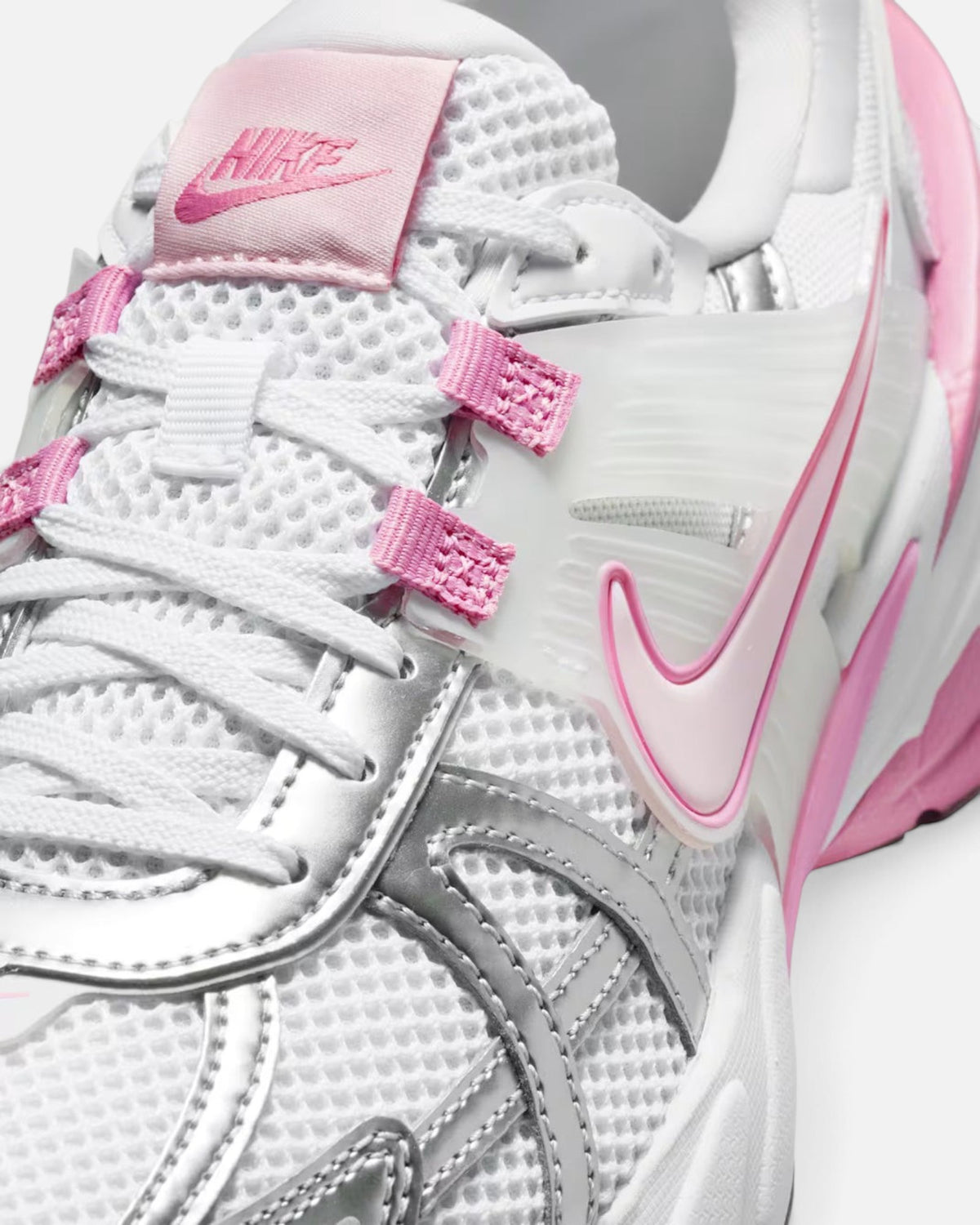 CRIUW NIKE V2K Run sneakers in white mesh with metallic silver overlays and pink foam accents on a chunky sole.