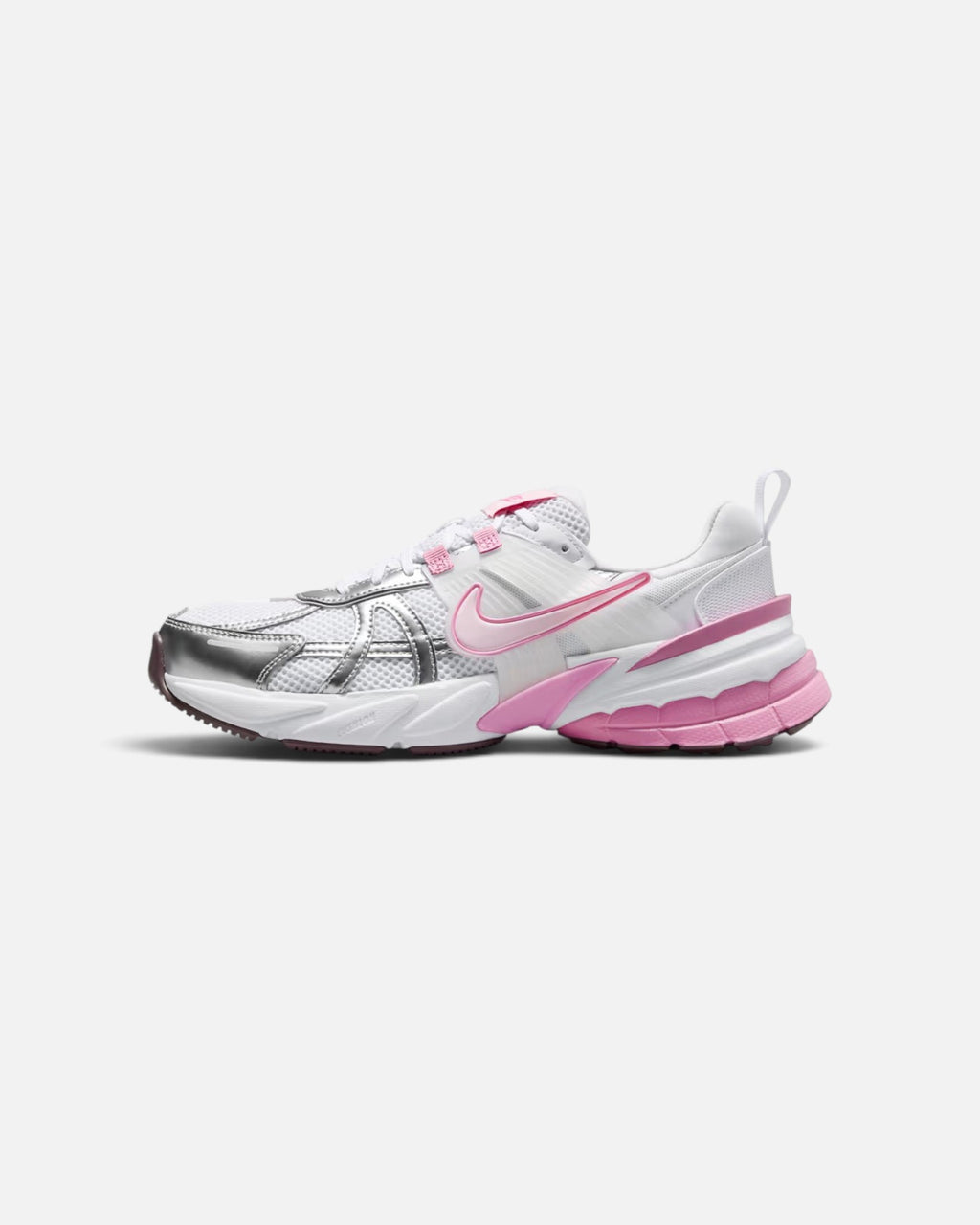 CRIUW Nike V2K Run sneakers in white, metallic silver, and pink foam with a chunky vintage-inspired midsole.