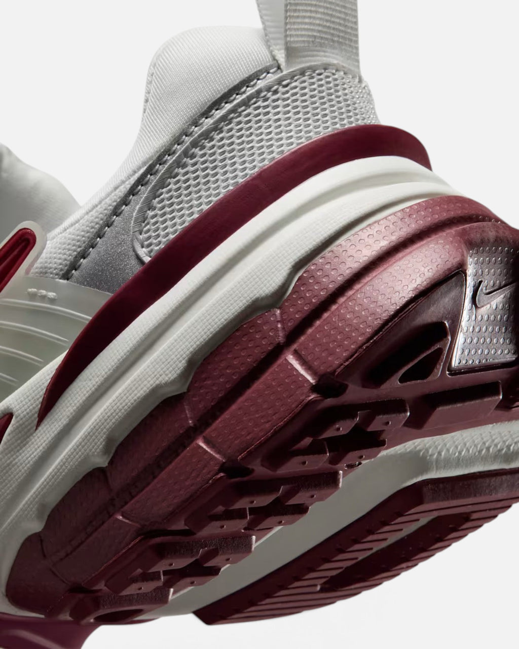 CRIUW NIKE V2K Run Pink Smoke sneaker showing detailed view of the chunky vintage-style midsole and textured heel