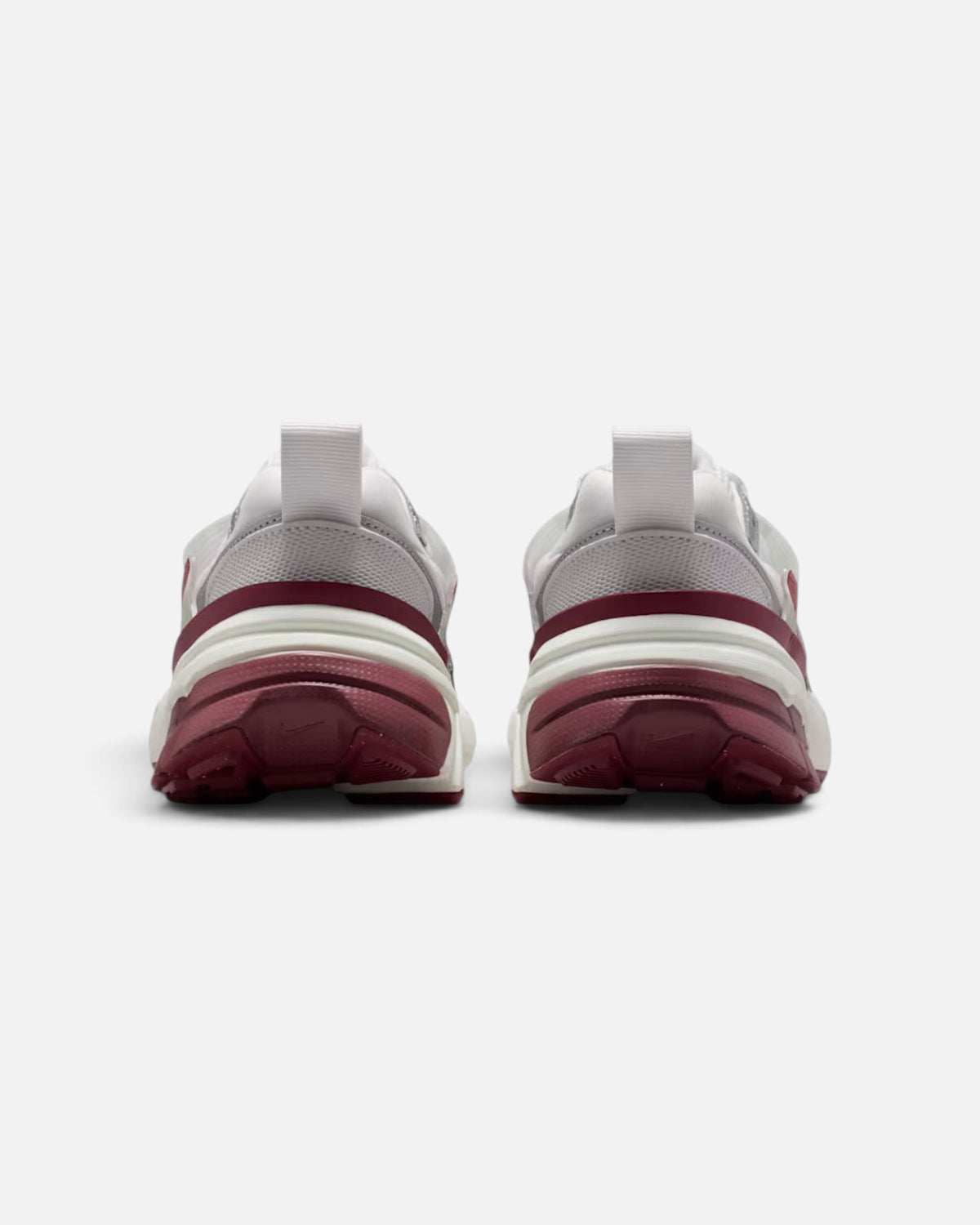 Rear view of CRIUW NIKE V2K Run sneakers in pink smoke with a chunky vintage-inspired midsole and plastic details.
