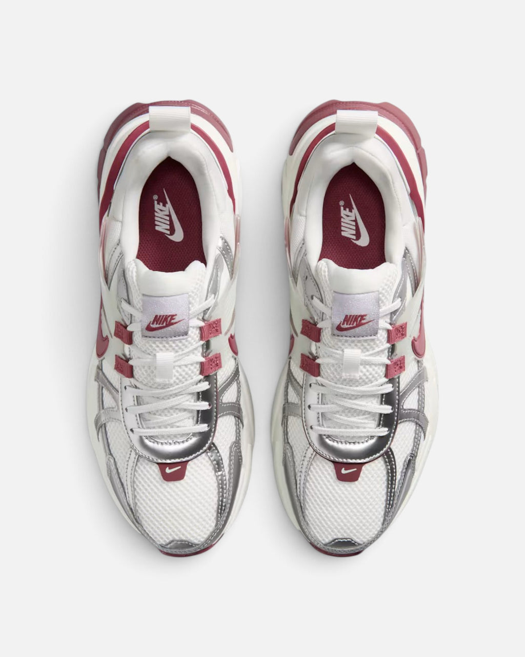CRIUW NIKE V2K Run sneakers in pink smoke and metallic silver with a retro 2000s running design and chunky heel.
