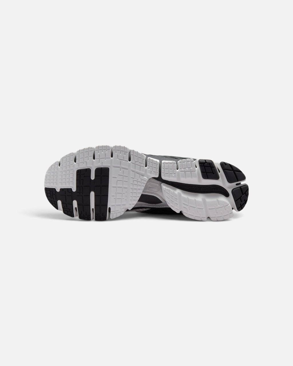CRIUW NIKE Zoom Skylon 11 Summit White sneaker showing the black and white rubber traction outsole with deep grooves.