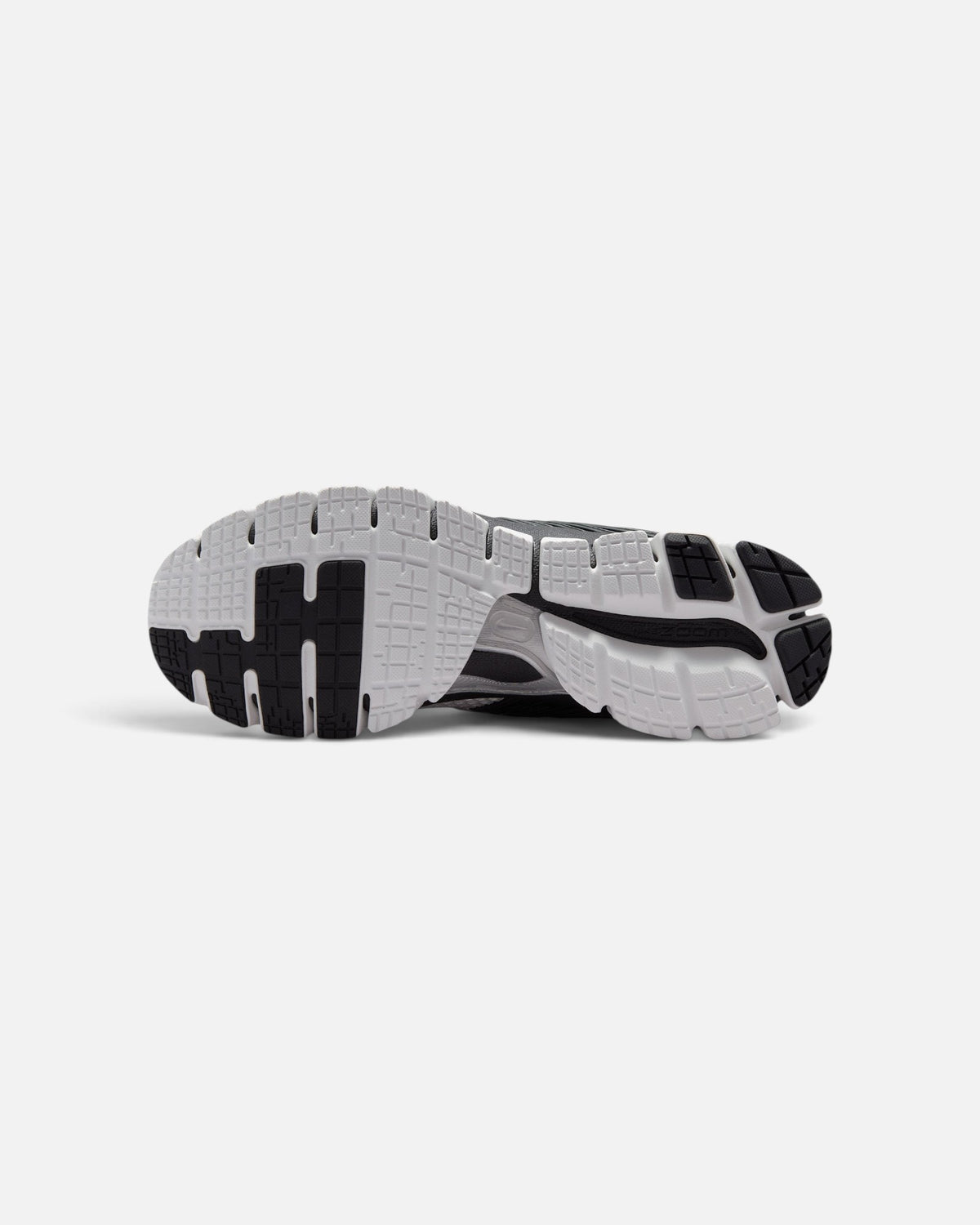 CRIUW NIKE Zoom Skylon 11 Summit White sneaker showing the black and white rubber traction outsole with deep grooves.