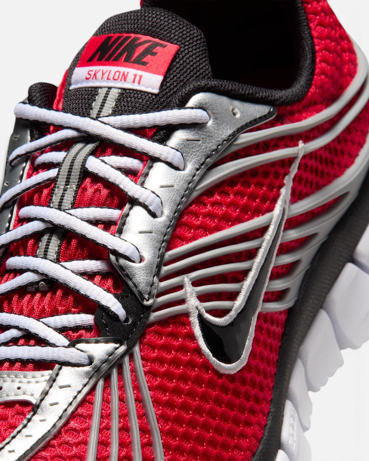 CRIUW NIKE Zoom Skylon 11 running shoe in university red mesh with metallic silver accents and black details