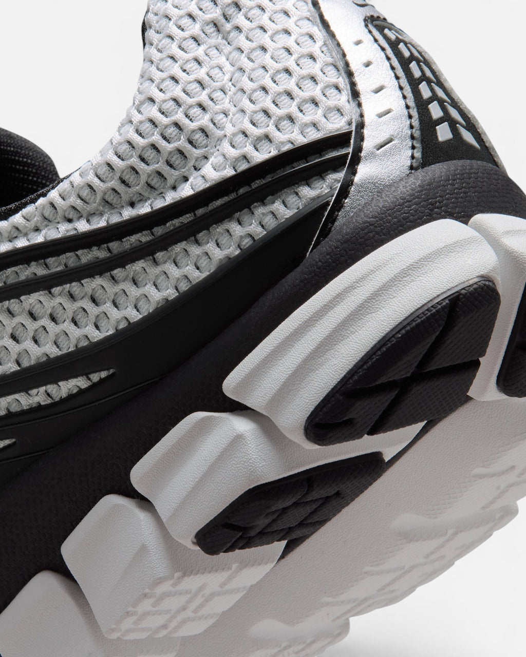 CRIUW Nike Zoom Skylon 11 sneaker in summit white with breathable mesh, metallic silver accents, and black detailing.