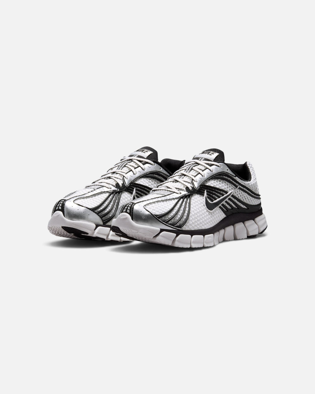 CRIUW Nike Zoom Skylon 11 sneakers in summit white with metallic silver overlays and black detailing