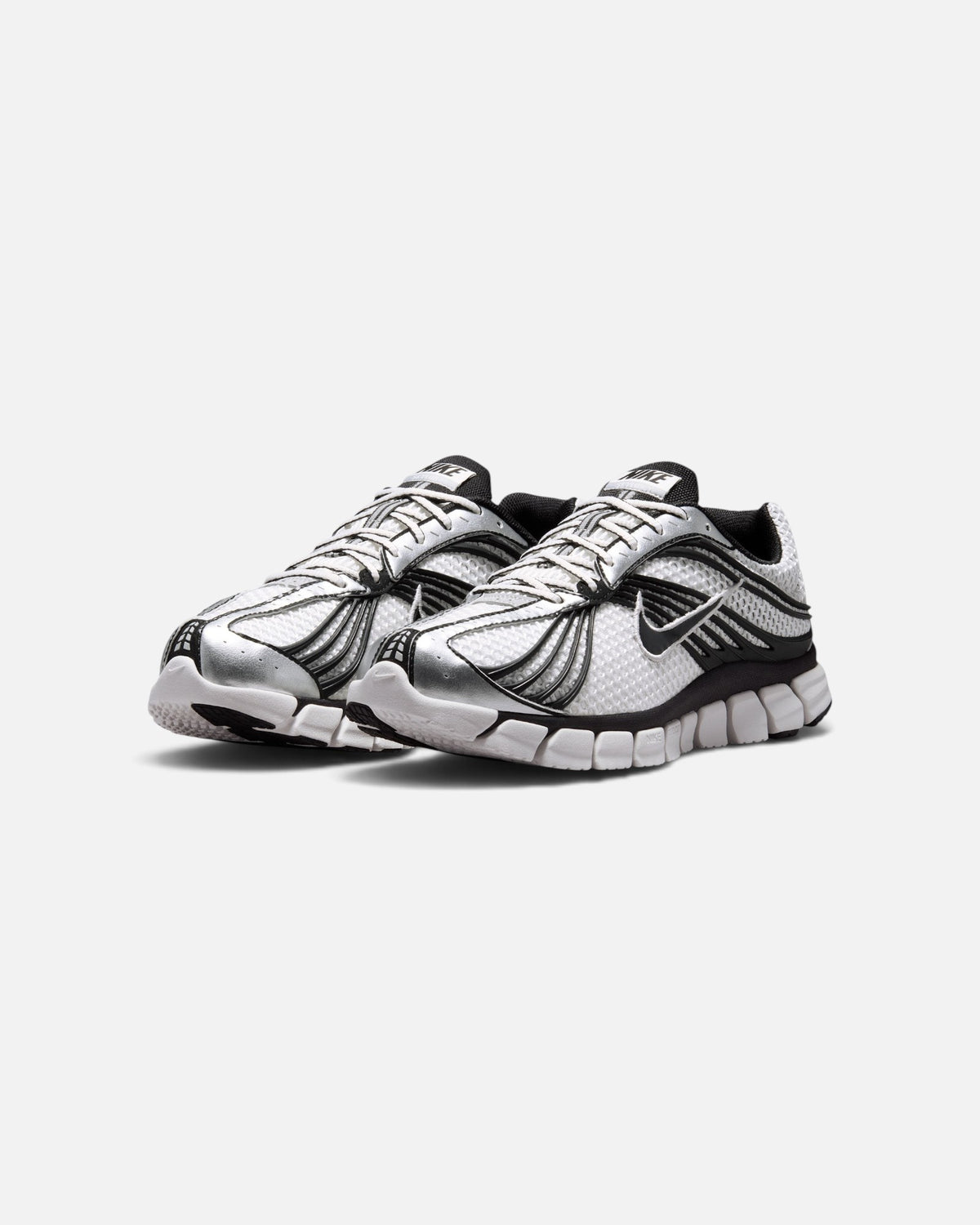 CRIUW Nike Zoom Skylon 11 sneakers in summit white with metallic silver overlays and black detailing