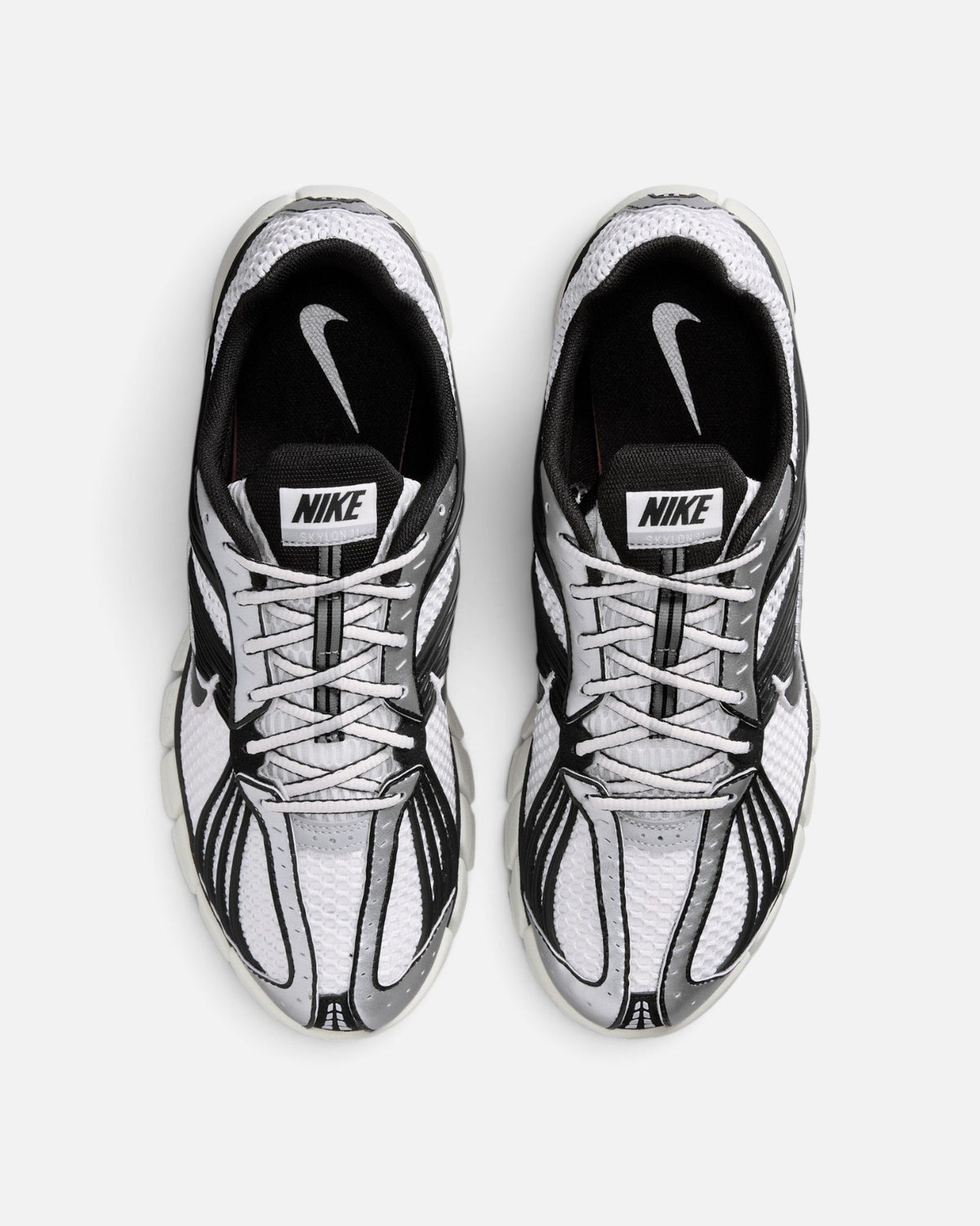 CRIUW Nike Zoom Skylon 11 sneakers in summit white with black and metallic silver accents and breathable mesh upper
