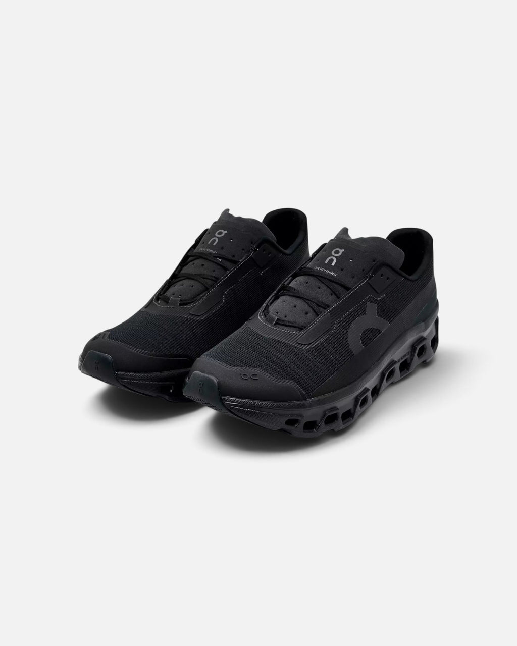 CRIUW ON Cloudmonster Void running shoes in all-black featuring technical mesh upper and cushioned sole