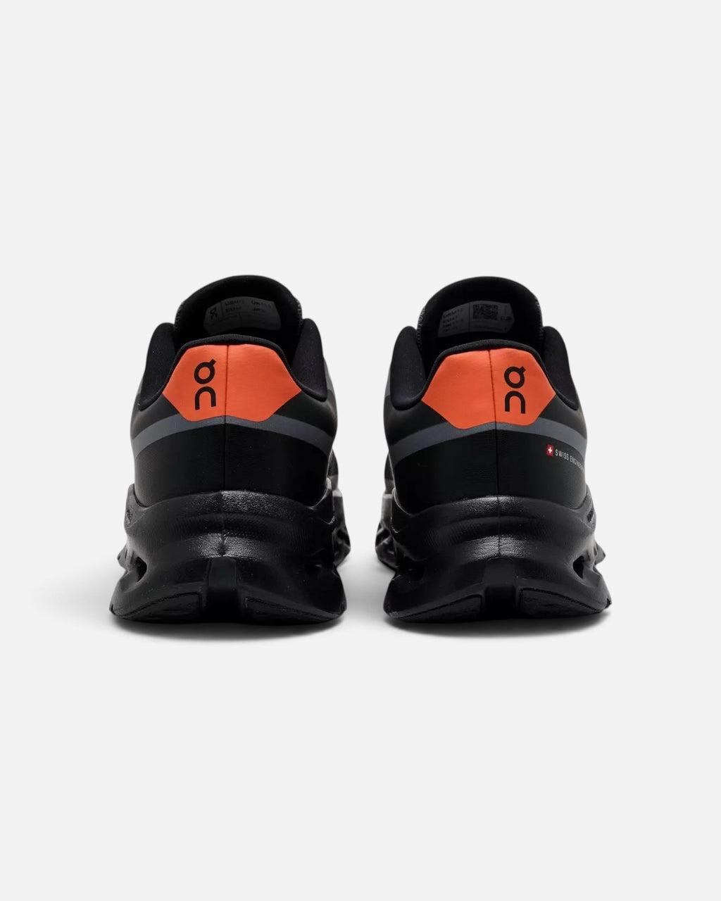 CRIUW On Cloudtilt Remix sneakers in black with flame orange heel detail, showing rear view of mesh upper.