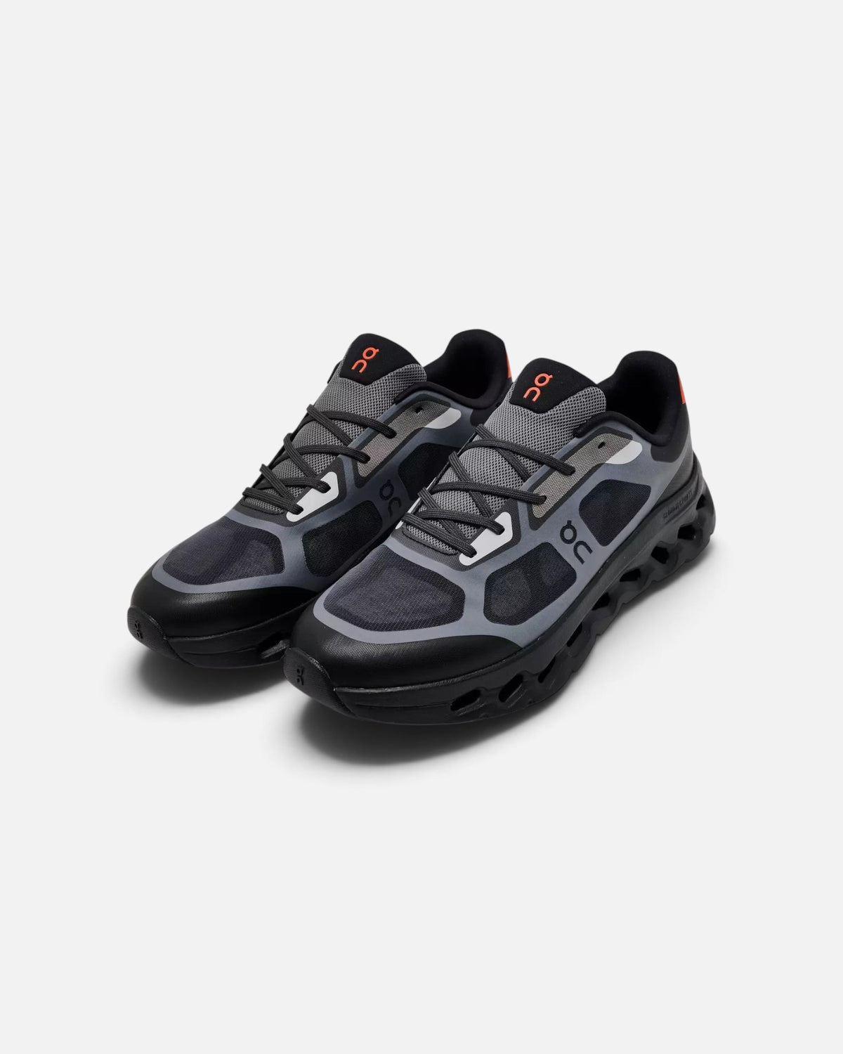 CRIUW On Cloudtilt Remix sneakers in black and grey mesh with flame orange accents and CloudTec cushioning