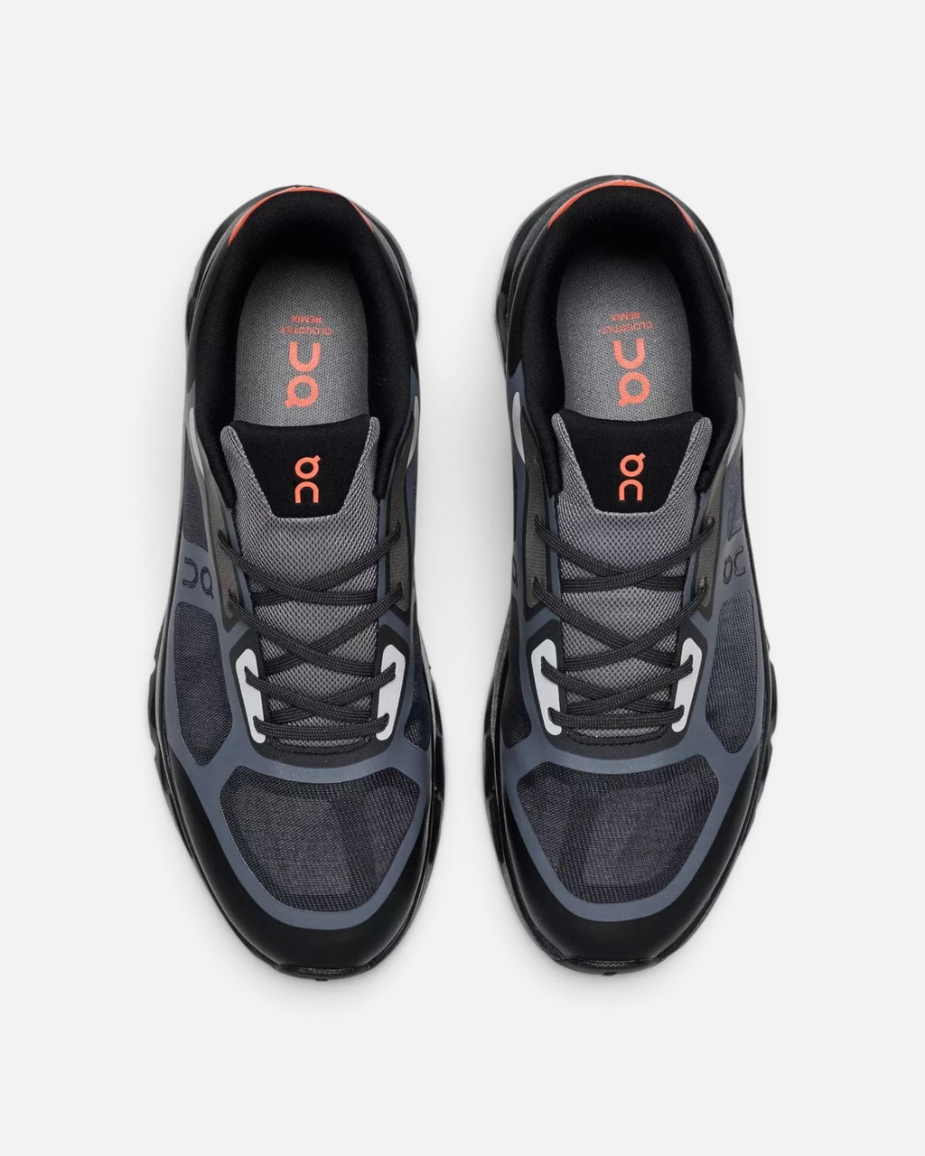 CRIUW On Cloudtilt Remix sneakers in black and grey with mesh upper and orange accents, top view.
