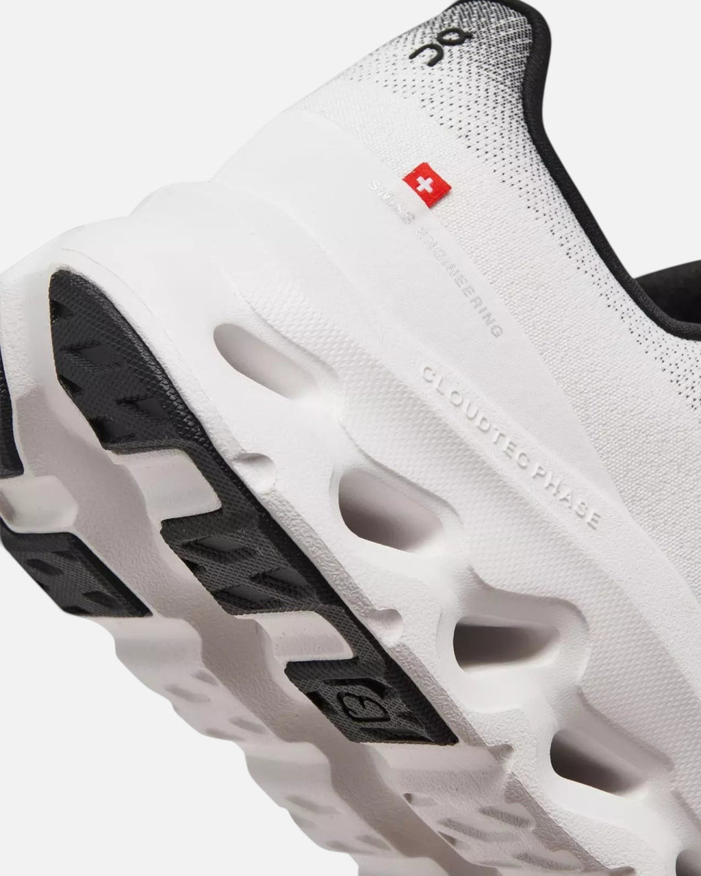 CRIUW ON Cloudtilt sneaker in black and ivory featuring CloudTec Phase cushioning and Swiss engineering detail.