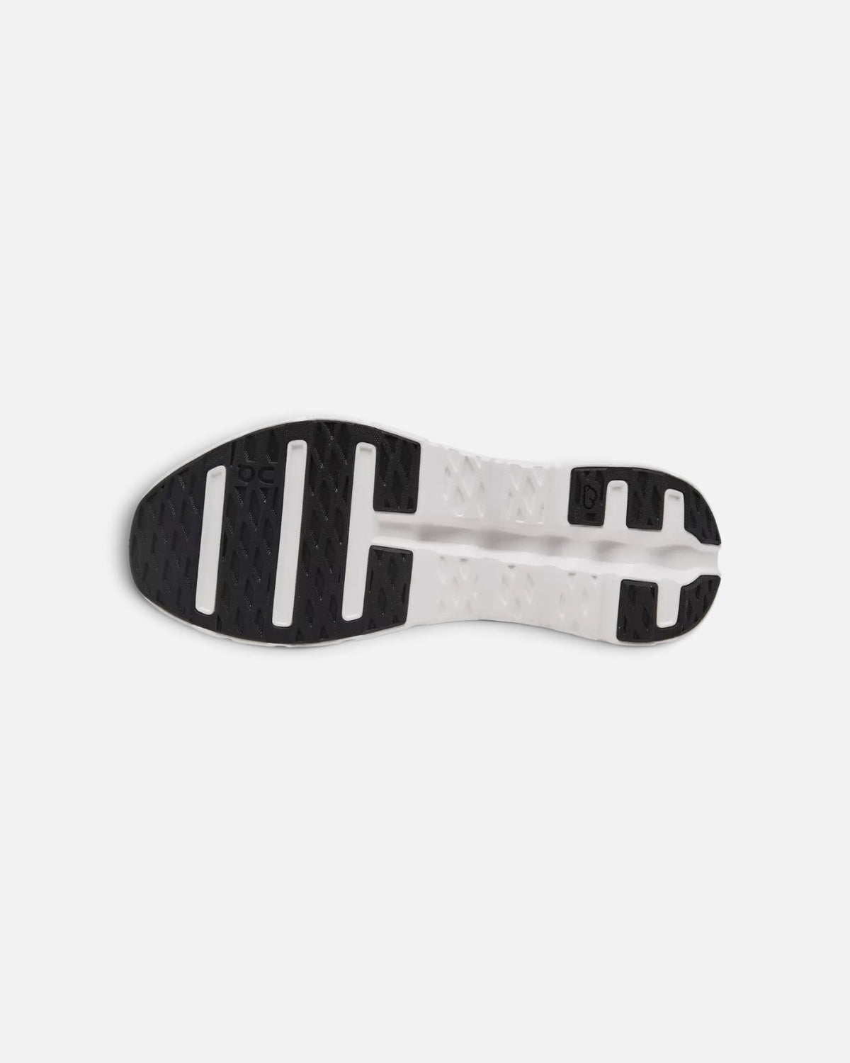 CRIUW ON Cloudtilt sneaker outsole in black and ivory featuring a textured grip pattern for performance cushioning.